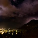 lightning over nighttime Lienz valley in the Austrian Alps.