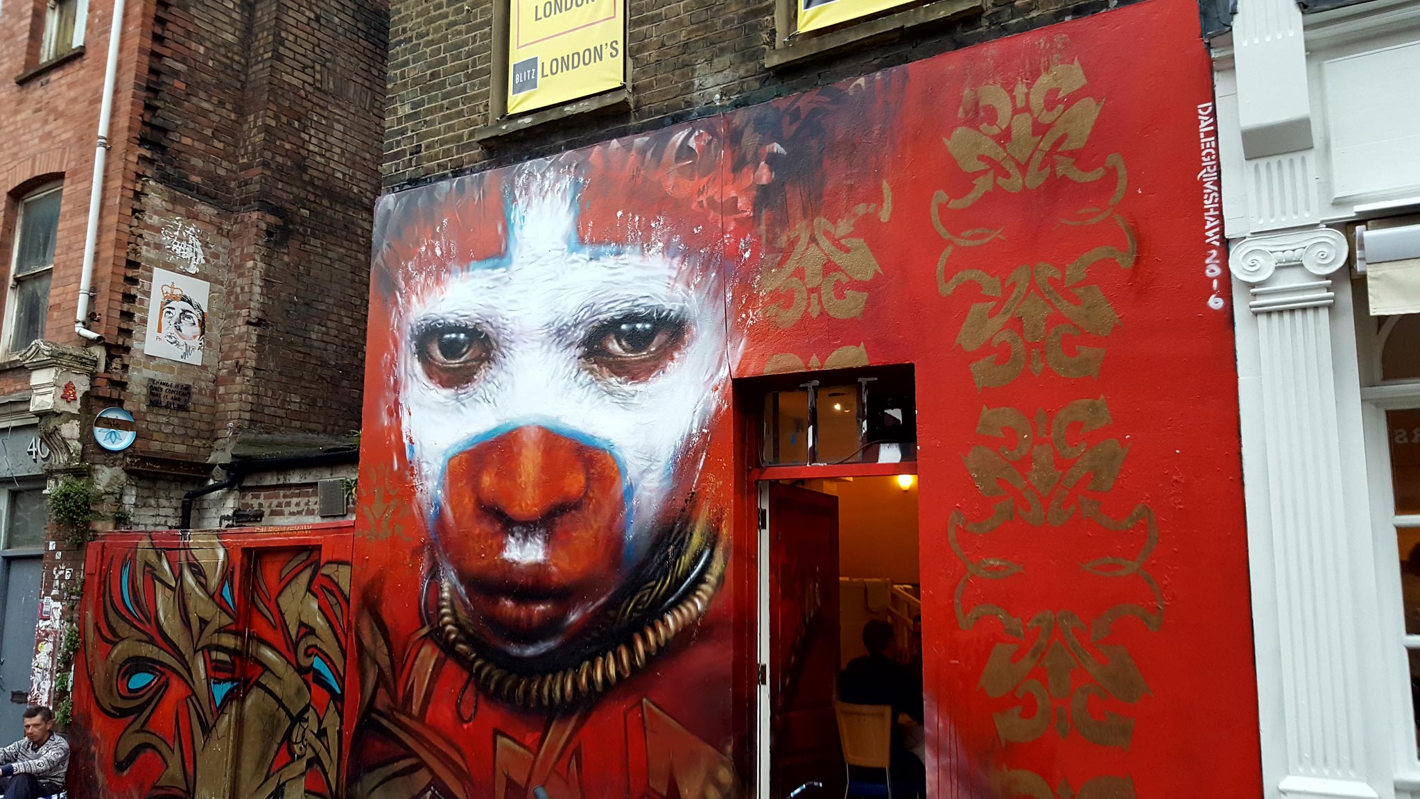 wariior with war paint by Dale Grimshaw in London, Eastend.